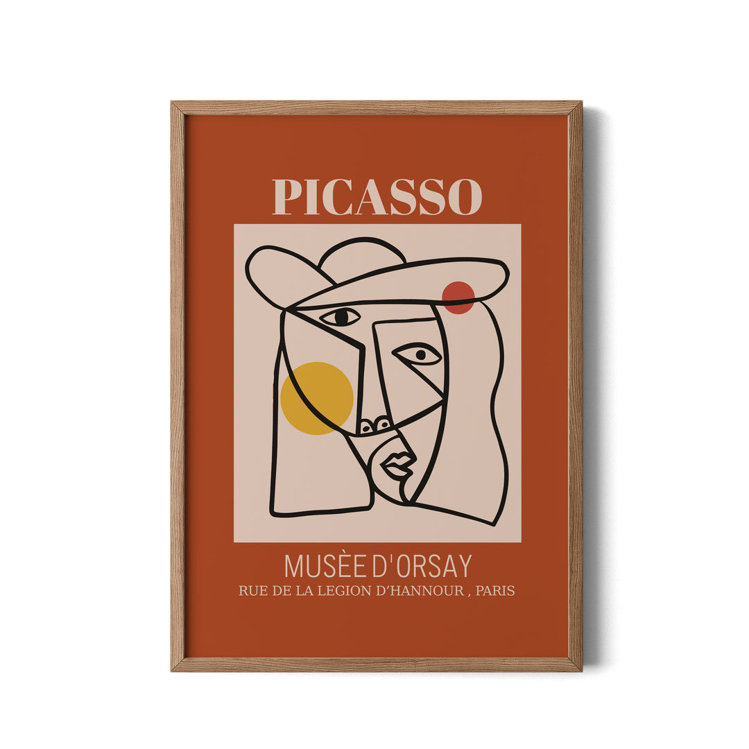 Framed artwork with Picasso face design and text on a white background